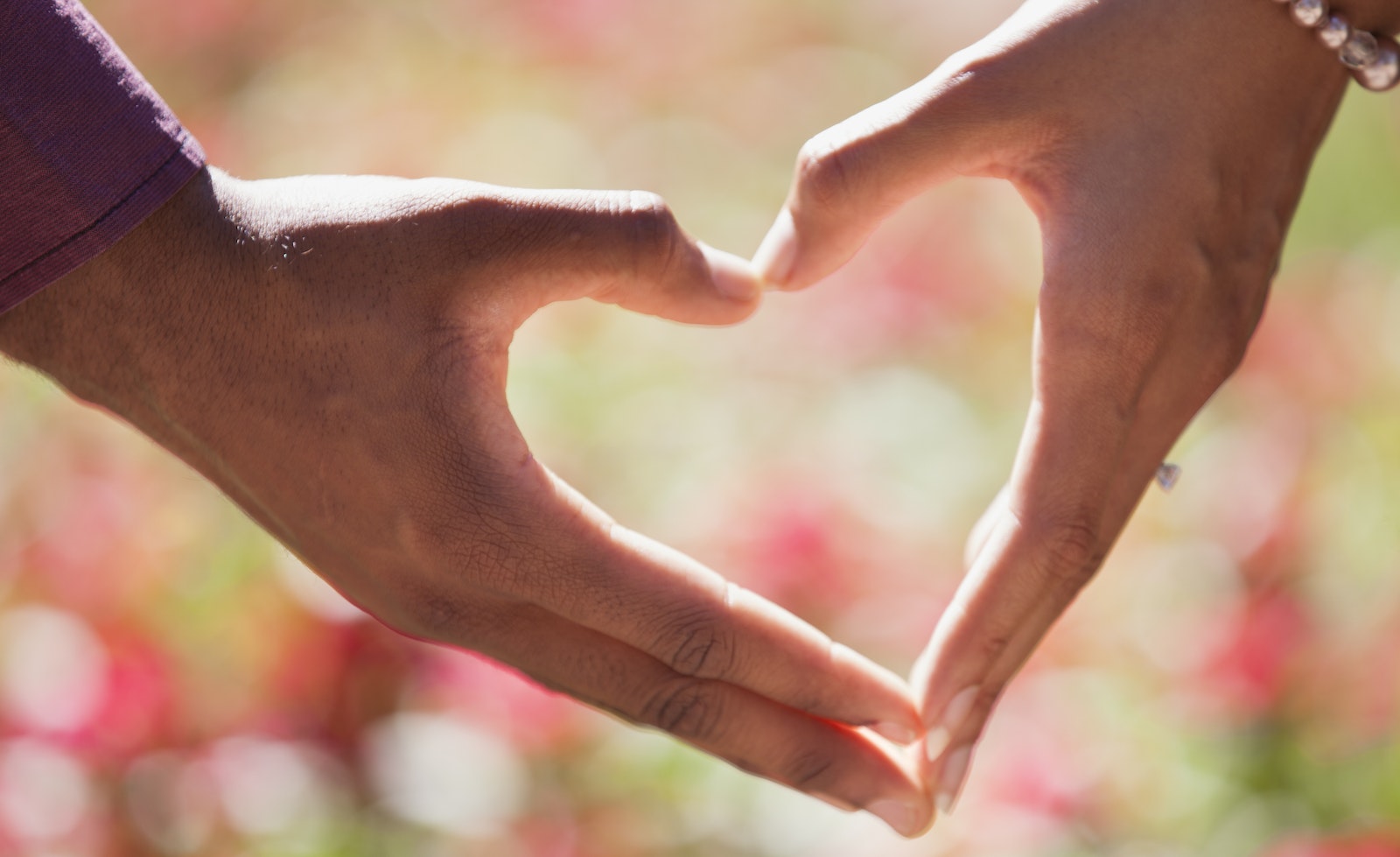 Heart Hand on Shallow Focus Lens